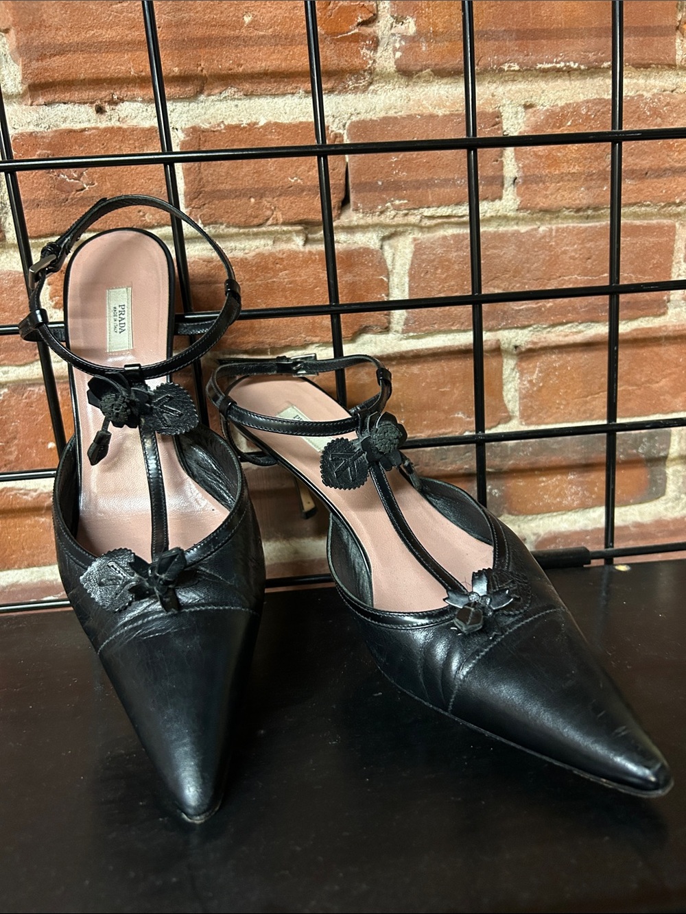 Prada Black Leather Pointed T-Strap Heels with Floral Appliqués